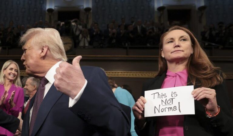 New Mexico Democrat says ‘This is not normal’ sign at Trump address was ‘an SOS to the world’