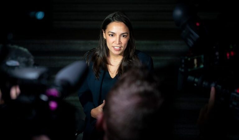 Ocasio-Cortez hits Trump immigration agenda as hecklers disrupt town hall