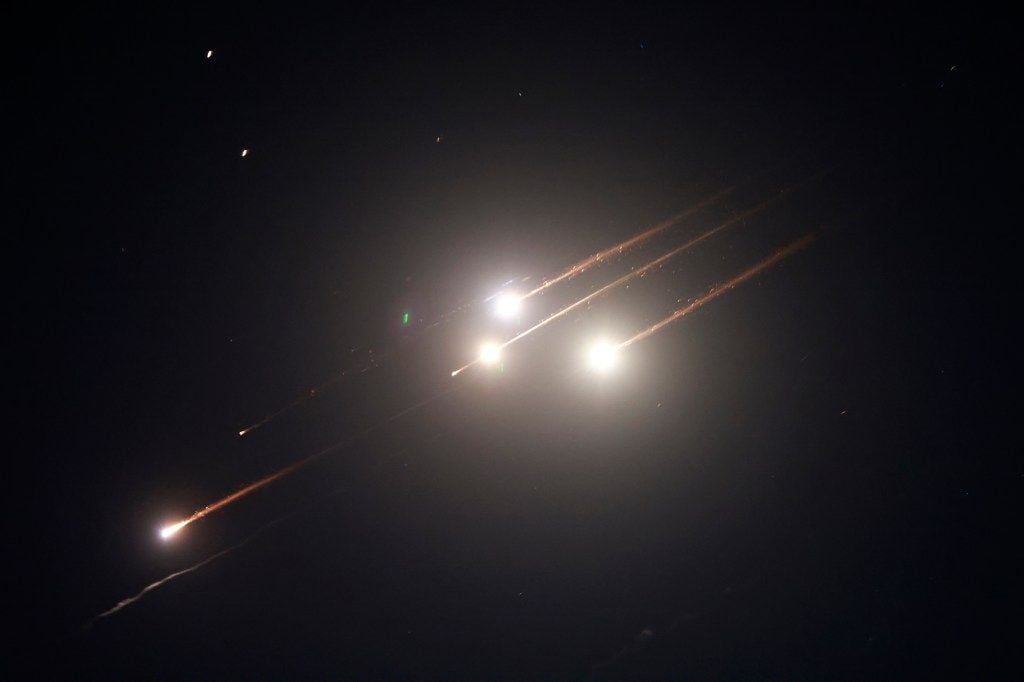 Rocket trails in the night sky above Jerusalem.