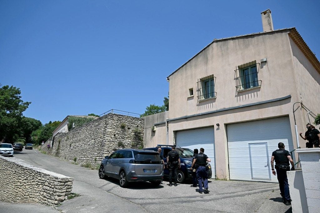 French gendarmes at the scene of a fatal shooting.