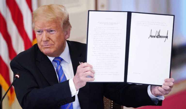 Trump Signs Landmark GENIUS Act, First US Stablecoin Law