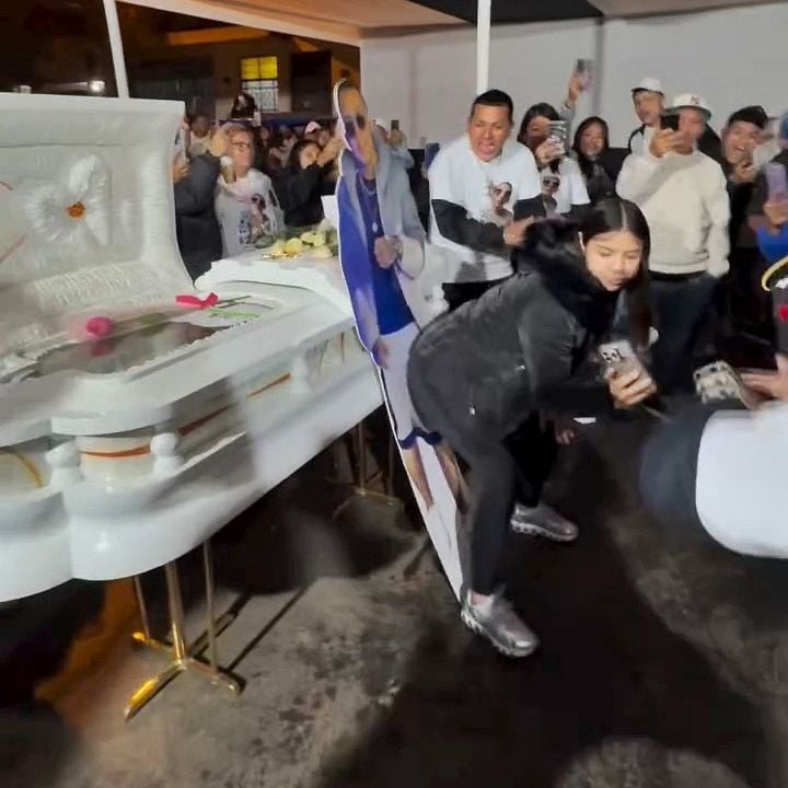 Widow twerking at her husband's funeral.