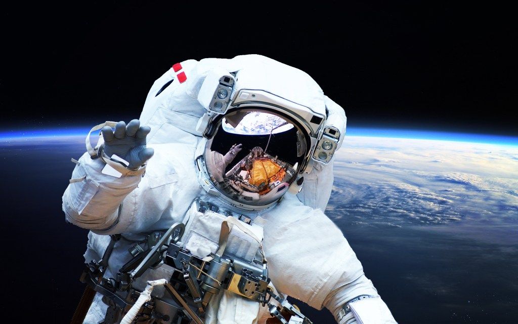 Astronaut performing a spacewalk.