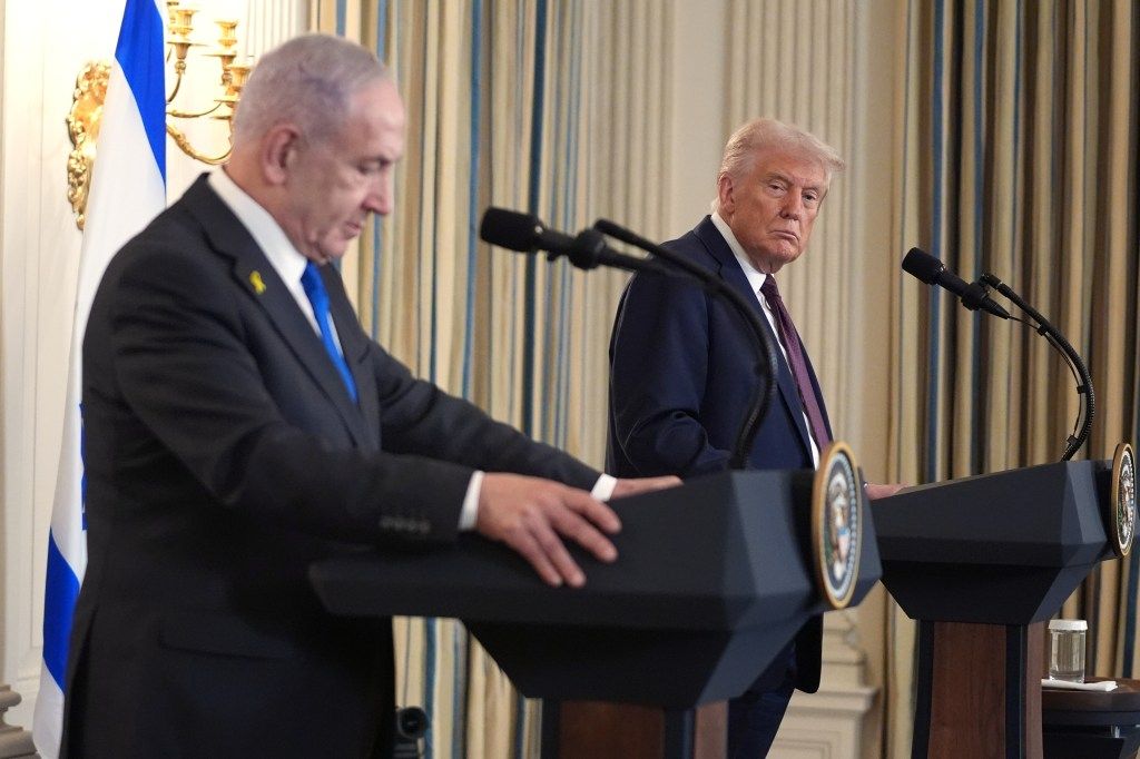 President Donald Trump listens during a news conference with Israeli Prime Minister Benjamin Netanyahu at the White House.