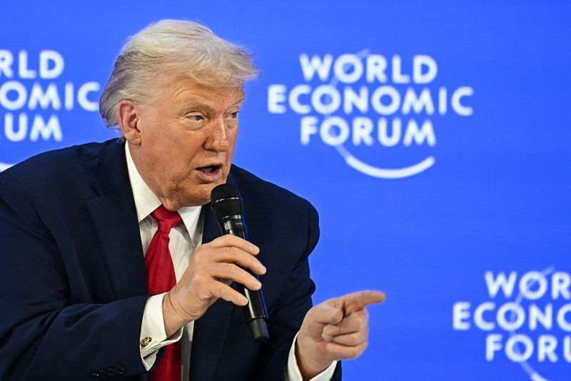 US President Donald Trump gestures as he speaks during the World Economic Forum (WEF) annual meeting in Davos on January 21, 2026. The World Economic Forum takes place in Davos from January 19 to January 23, 2026. (Photo by Fabrice COFFRINI / AFP via Getty Images)