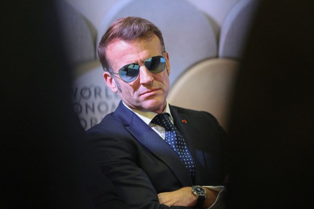 France's President Emmanuel Macron wearing sunglasses at the World Economic Forum.