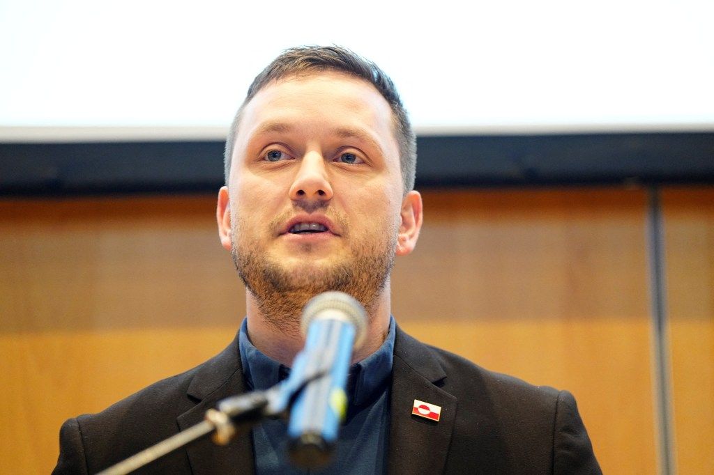 Greenland's Prime Minister Jens-Frederik Nielsen speaking at a press conference.