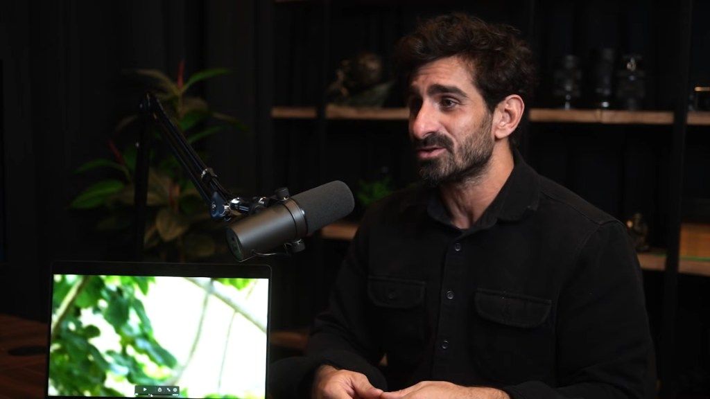 Paul Rosolie talking about uncontacted tribes with a laptop displaying footage of
</p>
<a class=