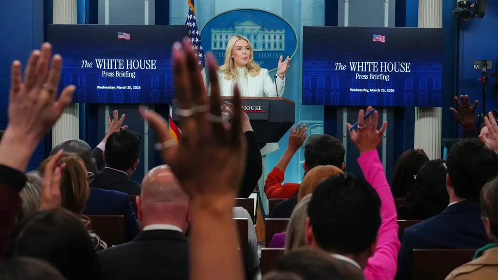 Leavitt speaks to a press conference at the White House