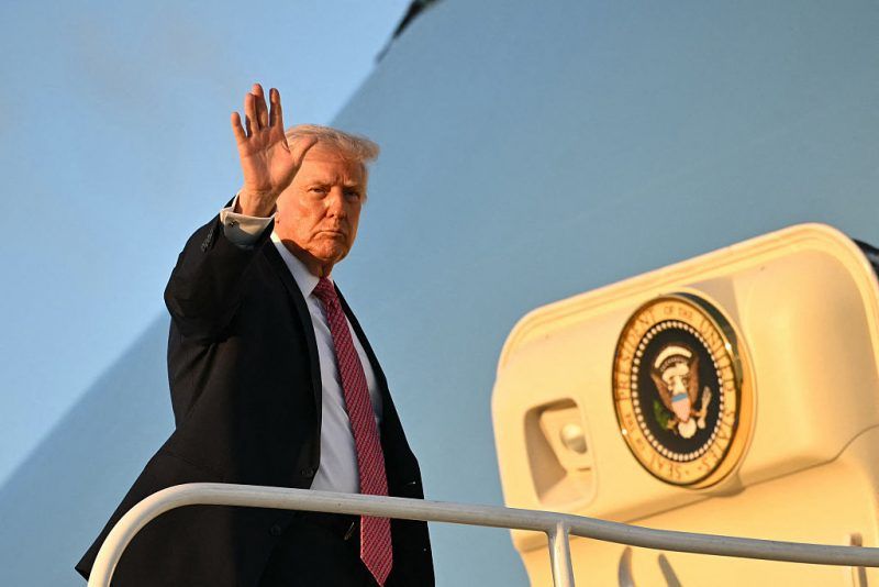 US President Donald Trump boards Air Force One before departing Miami International Airport in Miami, Florida on March 27, 2026. Trump is heading to Palm Beach, Florida to spend the weekend at his Mar-a-Lago resort. (Photo by Mandel NGAN / AFP via Getty Images)