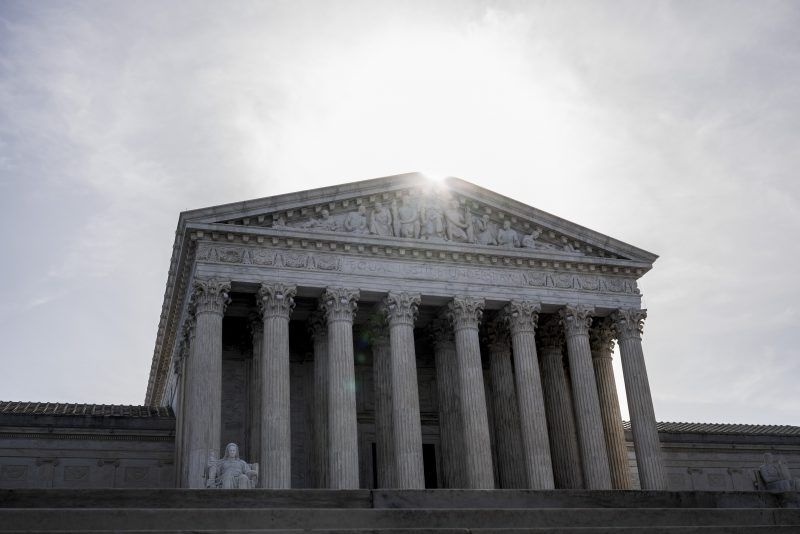 WASHINGTON, DC - MARCH 31: The sun rises above a facade of the U.S. Supreme Court building on March 31, 2026 in Washington, DC. The court found today that a Colorado law banning conversion therapy for gay and transgender minors likely violates free speech. (Photo by Roberto Schmidt/Getty Images)