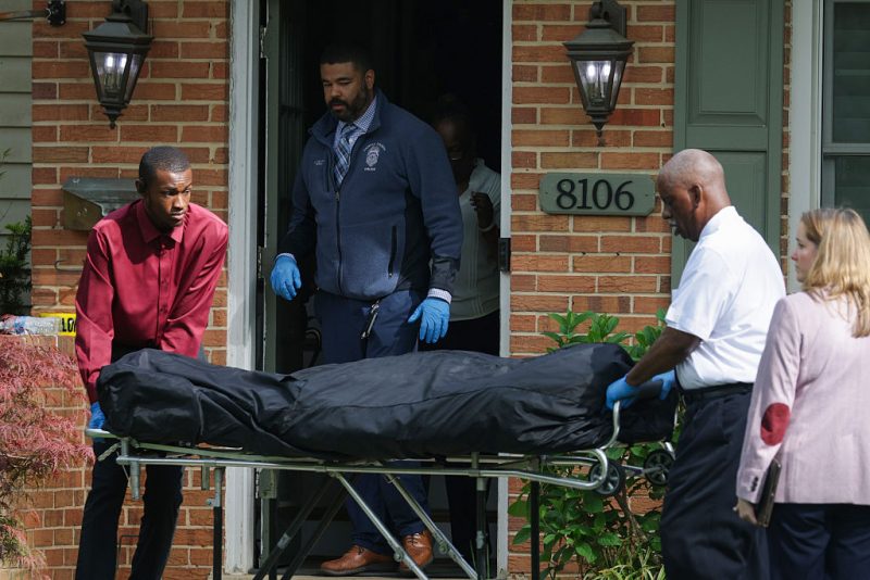 ANNANDALE, VIRGINIA - APRIL 16: A body is removed on a gurney from a crime scene outside the home of former Virginia Lt Gov Justin Fairfax on April 16, 2026 in Annandale, Virginia. According to police, Justin Fairfax, a former lieutenant governor of Virginia, and his wife, Cerina Fairfax, were found dead in a murder-suicide at their home. (Photo by Alex Wong/Getty Images)