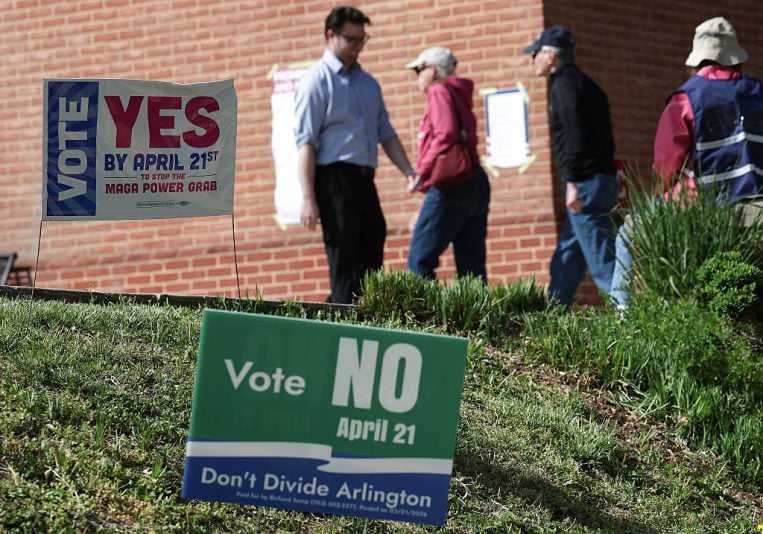 ARLINGTON, VIRGINIA - APRIL 21: Voters arrive before casting their ballots at a polling location at the Westover Library on April 21, 2026 in Arlington, Virginia. Virginia voters will decide today on a statewide ballot question on whether to allow the Virginia General Assembly to redraw congressional districts which could affect how the state’s U.S. House districts are mapped in upcoming elections and shift political balance. (Photo by Win McNamee/Getty Images)