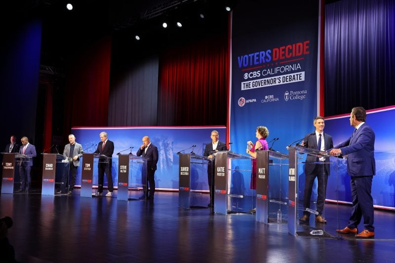 CLAREMONT, CALIFORNIA - APRIL 28: (L-R) Tony Thurmond (D), Chad Bianco (R), Tom Steyer (D), Steve Hilton (R), Xavier Becerra (D), Katie Porter (D), Matt Mahan (D) and Antonio Villaraigosa (D) speak during CBS Television Stations' California Gubernatorial Debate on April 28, 2026 in Claremont, California. (Photo by Leon Bennett/Getty Images for CBS Television Stations)