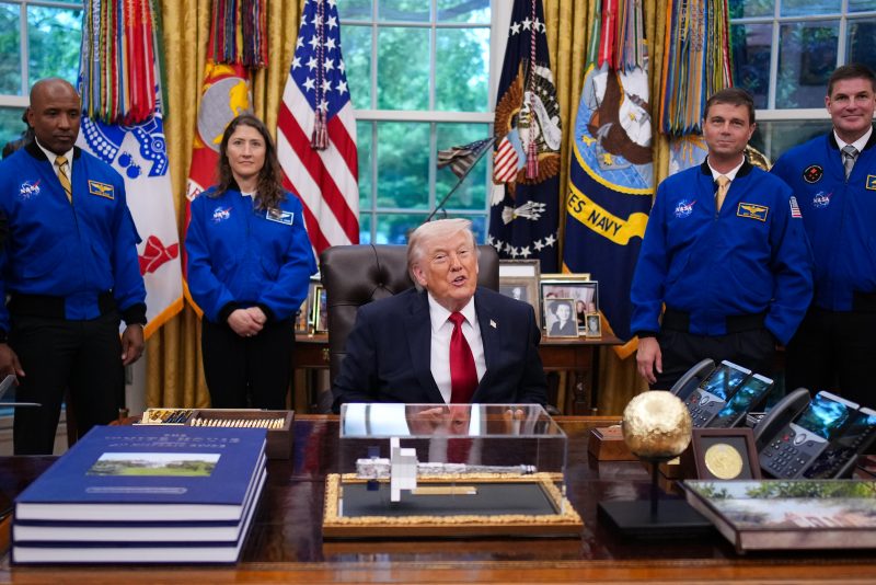 WASHINGTON, DC - APRIL 29: U.S. President Donald Trump speaks during an event with the Artemis II astronauts, pilot Victor Glover, mission specialist Christina Koch and commander Reid Wiseman in the Oval Office of the White House on April 29, 2026 in Washington, DC. The astronauts set a new record for the farthest any human has ever traveled into space aboard the Artemis II Space Launch System rocket and Orion spacecraft, orbiting around the moon and back while reaching 252,756 miles from Earth. (Photo by Andrew Harnik/Getty Images)