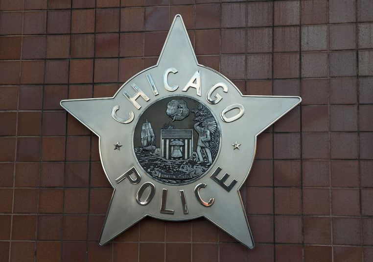 CHICAGO, IL - DECEMBER 01: A Chicago police badge hangs in front of the City of Chicago Public Safety Headquarters on December 1, 2015 in Chicago, Illinois. Following public outcry over the way police handled the shooting death of Laquan McDonald by Chicago police officer Jason Van Dyke, Mayor Rahm Emanuel today announced he had fired Chicago Police Superintendant Garry McCarthy. McCarthy, Emanuel and Cook County States Attorney Anita Alvarez have been accused of trying to cover up the shooting. (Photo by Scott Olson/Getty Images)