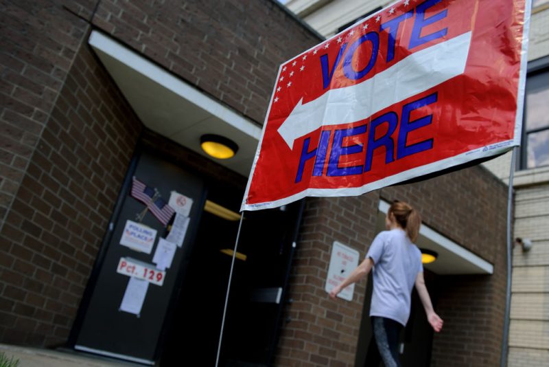 WHEELING, WV - MAY 08: Voters head into the polls outside the Tridelphia Middle School polling place on May 8, 2018 in Wheeling, West Virginia. West Virginia voters headed to the polls Tuesday to vote in the Spring primaries. (Photo by Jeff Swensen/Getty Images)