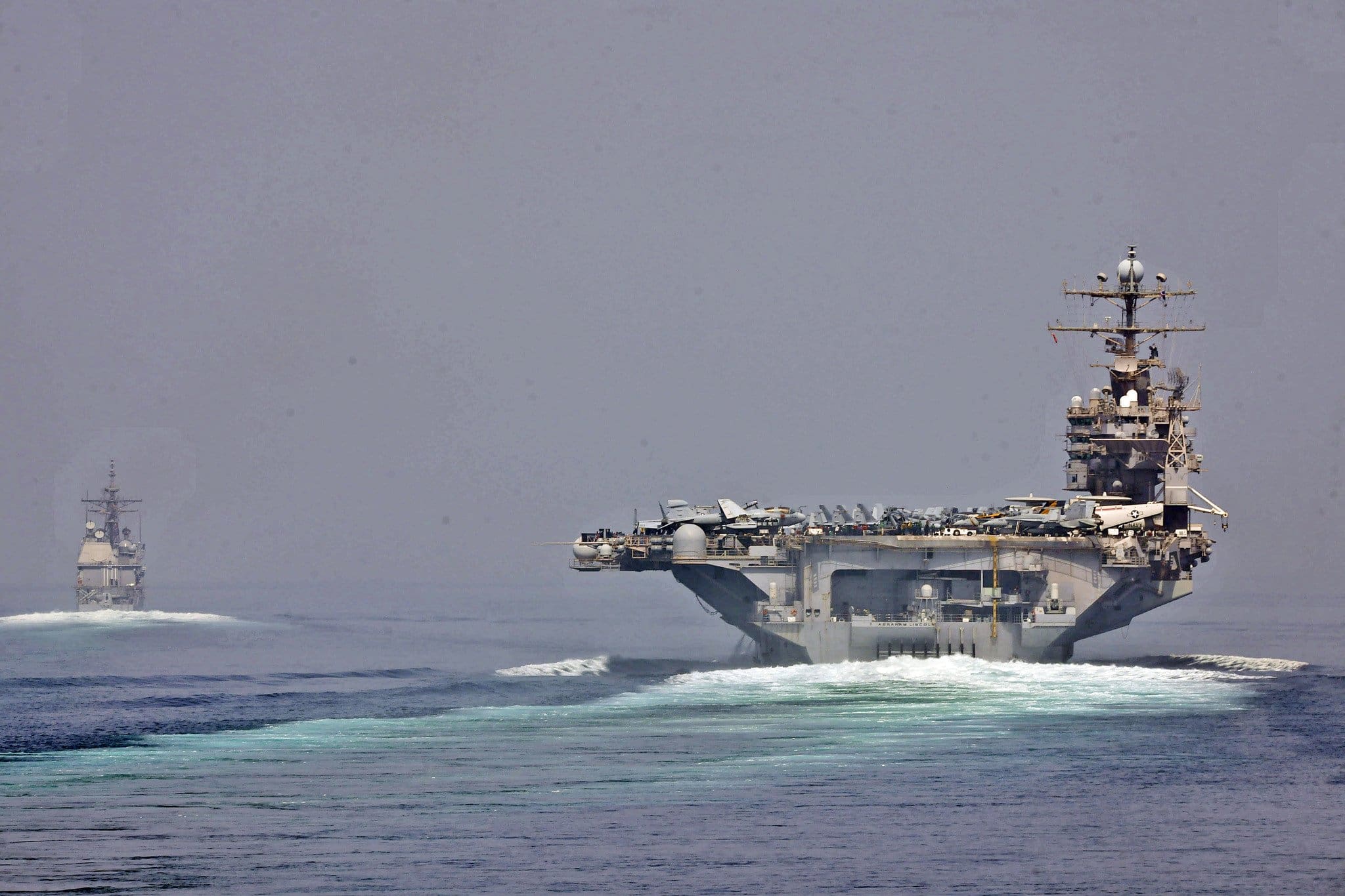 U.S. Navy ships transiting the Strait of Hormuz.