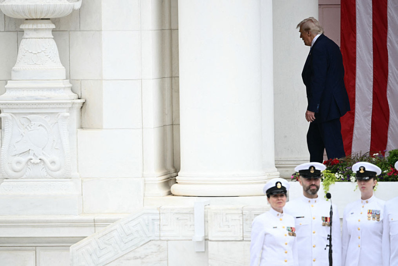 US President Donald Trump leaves the stage after delivering remarks at the National Memorial Day Observance at the Memorial Amphitheatre in Arlington National Cemetery in Arlington, Virginia, on May 26, 2025. (Photo by Brendan SMIALOWSKI / AFP) (Photo by BRENDAN SMIALOWSKI/AFP via Getty Images)