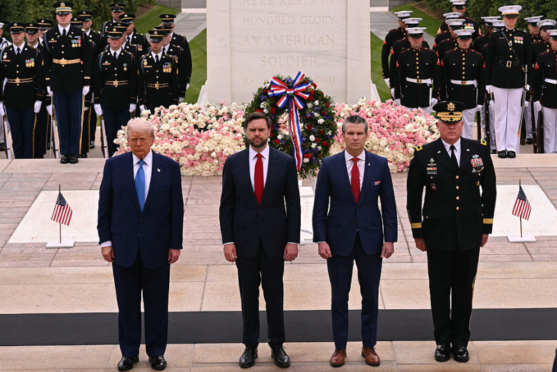 US President Donald Trump (L), US Vice President JD Vance (2L), US Secretary of Defense Pete Hegseth (2R), and MG Trevor Bredenkamp, Commanding General of the Joint Task Force-National Capital Region and the US Military District of Washington, look on after laying a wreath at the Tomb of the Unknown Soldier in Arlington National Cemetery in Arlington, Virginia, on Memorial Day, May 26, 2025. (Photo by SAUL LOEB / AFP) (Photo by SAUL LOEB/AFP via Getty Images)