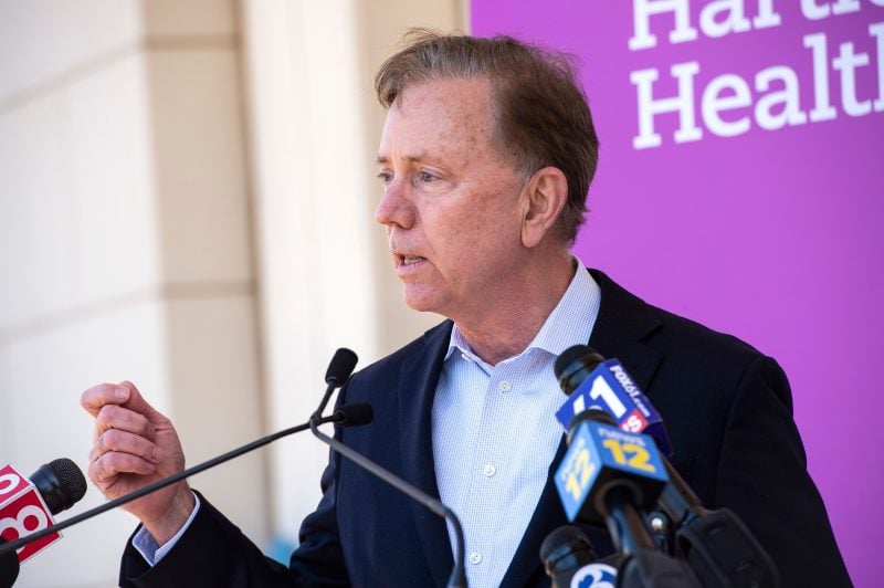 Connecticut Governor Edward Miner "Ned" Lamont Jr. (D) speaks about the states efforts to get more people vaccinated at Hartford HealthCare St. Vincent's Medical Center in Bridgeport, Connecticut on February 26, 2021. - Nine local clergy members were given the Pfizer-BioNTech Covid-19 Vaccine, aiming to educate and inspire their parishioners and minority communities to get vaccinated. (Photo by Joseph Prezioso / AFP) (Photo by JOSEPH PREZIOSO/AFP via Getty Images)