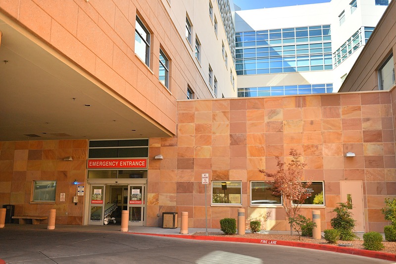 ALBUQUERQUE, NEW MEXICO - OCTOBER 22: An exterior view shows the emergency entrance to the University of New Mexico Hospital, where "Rust" Director of Photography Halyna Hutchins was transported and later pronounced dead after being injured during filming, on October 22, 2021 in Albuquerque, New Mexico. Hutchins was killed and director Joel Souza was injured on set while filming the movie "Rust" at Bonanza Creek Ranch near Santa Fe, New Mexico on October 21, 2021. The film's star and producer Alec Baldwin discharged a prop firearm that hit Hutchins and Souza. (Photo by Sam Wasson/Getty Images)