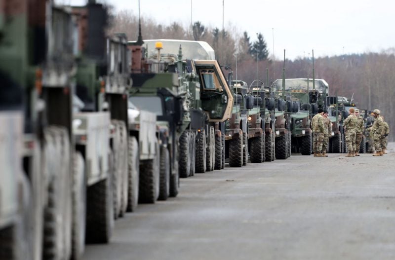 VILSECK, GERMANY - FEBRUARY 09: Soldiers of 2nd Squadron, 2nd Cavalry Regiment of the U.S. Army are pictured during the preparation of armoured combat vehicles before deploying to Romania on February 09, 2022 in Vilseck, Germany. The troops will join other US troops already there as part of a coordinated deployment of NATO forces across eastern Europe. The effort is part of NATO's response to the large-scale build up of Russian troops on the border to Ukraine, which has caused international fears of an imminent Russian military invasion. (Photo by Alexandra Beier/Getty Images)
