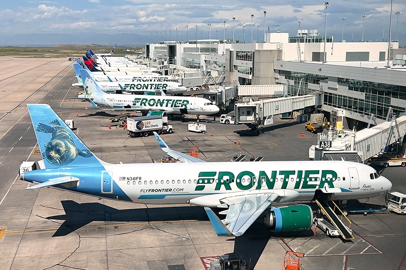 Frontier Airlines planes are parked at gates in Denver International Airport (DEN) in Denver, Colorado, on August 5, 2023. (Photo by Daniel SLIM / AFP) (Photo by DANIEL SLIM/AFP via Getty Images)