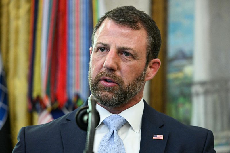 Newly sworn in Secretary of Homeland Security Markwayne Mullin speaks in the Oval Office of the White House in Washington, DC, on March 24, 2026. The US Senate on Monday confirmed Mullin as the new chief of the Department of Homeland Security (DHS), the agency reeling from a partial government shutdown as it works to enforce President Donald Trump's immigration crackdown. (Photo by Jim WATSON / AFP via Getty Images)