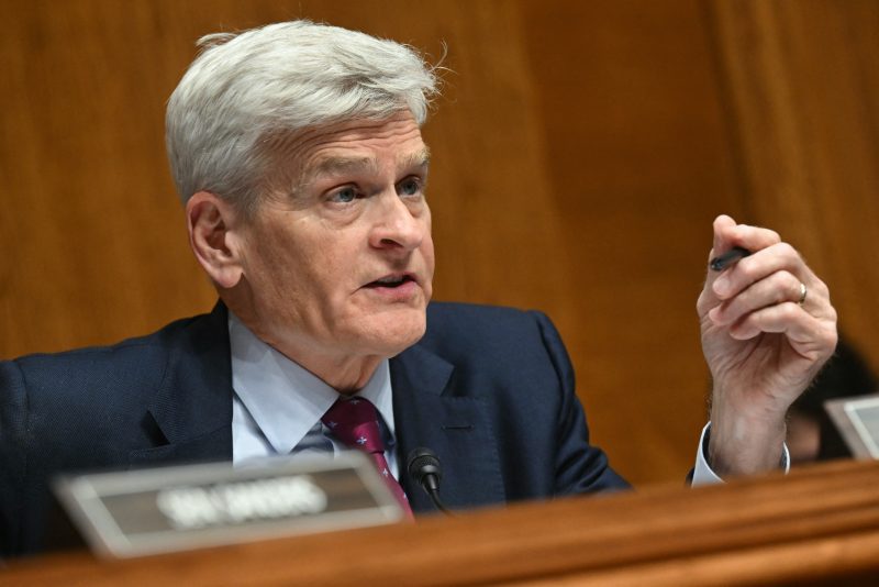 US Senator Bill Cassidy, Republican from Louisiana, questions Secretary of Health and Human Services Robert F. Kennedy Jr. during a Senate Committee on Health, Education, Labor and Pensions hearing on "proposed budget estimates for fiscal year 2027 for the Department of Health and Human Services" on Capitol Hill in Washington, DC, on April 22, 2026. (Photo by SAUL LOEB / AFP via Getty Images)