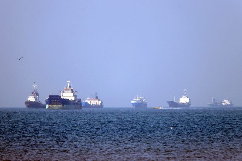 TOPSHOT - In this picture obtained from Iran's ISNA news agency on May 4, 2026, vessels are pictured anchored in the Strait of Hormuz off Bandar Abbas in southern Iran. Iran's Revolutionary Guards on May 4 denied that any commercial ships had crossed the Strait of Hormuz, after the US military earlier said two US-flagged merchant vessels had transited through the vital waterway. (Photo by Amirhossein KHORGOOEI / ISNA / AFP via Getty Images) /
