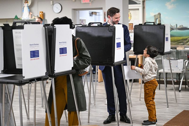 CINCINNATI, OHIO - MAY 5: US Vice President JD Vance casts his ballot with his son Vivek at a polling location at St. Anthony of Padua Maronite Catholic Church as he votes in the state's primary election, on May 5, 2026 in Cincinnati, Ohio. Vance stopped in Ohio to vote in the state's primary election before heading to Iowa to speak at a manufacturing facility in Des Moines. (Photo by Roberto Schmidt-Pool/Getty Images)