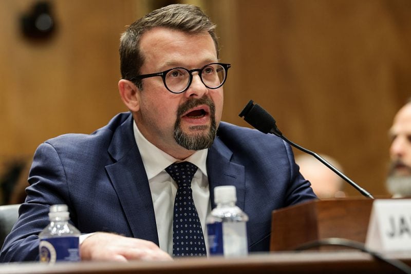 WASHINGTON, DC - MAY 13: CIA whistleblower James Erdman III, a senior operations officer, speaks during a hearing with the Senate Homeland Security Committee in the Dirksen Senate Office Building on May 13, 2026 in Washington, DC. The committee held the hearing titled "Whistleblower Testimony on the Covid Cover Up" to discuss Erdman's alleged findings that there was an effort within the Intelligence Community to downplay the possibility that the COVID-19 pandemic originated in a potential lab leak. (Photo by Anna Moneymaker/Getty Images)