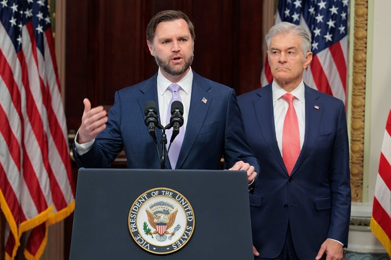 WASHINGTON, DC - MAY 13: U.S. Vice President JD Vance speaks alongside Administrator for the Centers for Medicare & Medicaid Services Dr. Mehmet Oz (R) during a press conference on the Trump administration's anti-fraud initiatives at the Eisenhower Executive Office Building on May 13, 2026 in Washington, DC. Vance announced plans for the government to cut federal funding for Medicaid expenses in states who fail to comply with anti-fraud safeguards. (Photo by Chip Somodevilla/Getty Images)
