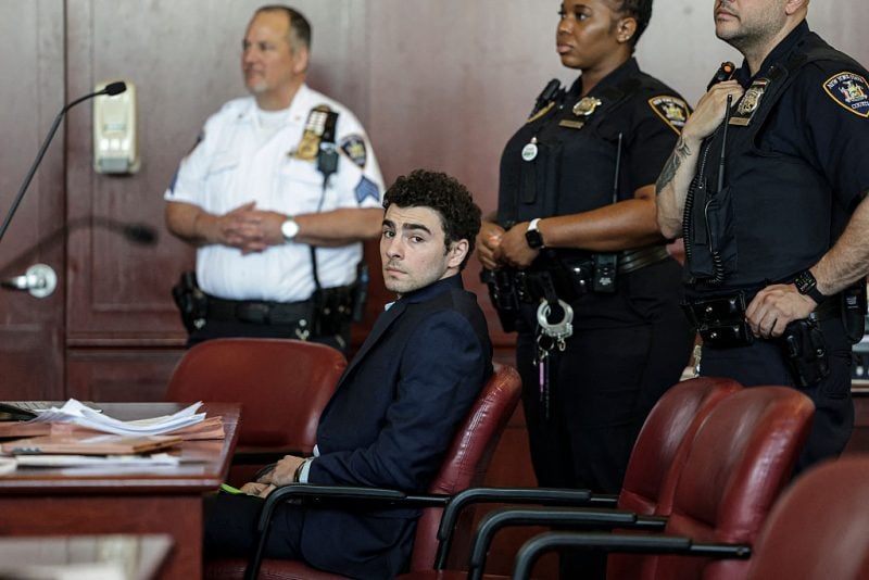 Luigi Mangione, accused of the murder of United Healthcare CEO Brian Thompson, attends a court hearing to rule on the admissibility of evidence and setting of trial date in New York, on May 18, 2026. (Photo by Jeenah Moon / POOL / AFP via Getty Images)