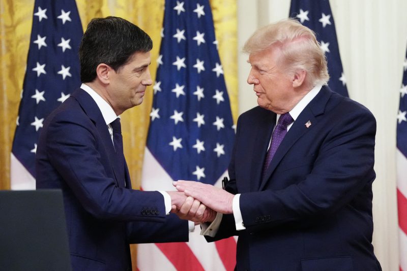 TOPSHOT - US President Donald Trump shakes hands with the new Chairman of the Federal Reserve Kevin Warsh (L) during a swearing in ceremony in the East Room of the White House in Washington, DC on May 22, 2026. The US Senate confirmed Kevin Warsh as the new Federal Reserve Chairman on May 13 to lead a central bank whose independence is under attack and with inflation at a three-year high. (Photo by Aaron Schwartz / AFP via Getty Images)