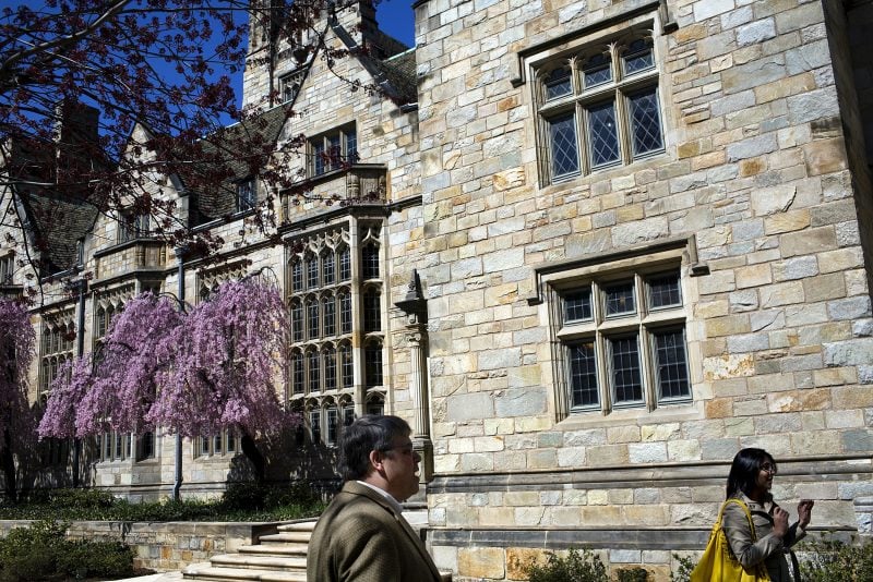 NEW HAVEN, CT - APRIL 15: People walk past the visitor's center on the campus of Yale University April 15, 2008 in New Haven, Connecticut. New Haven boasts many educational and cultural offerings that attract visitors to the city. (Photo by Christopher Capozziello/Getty Images)