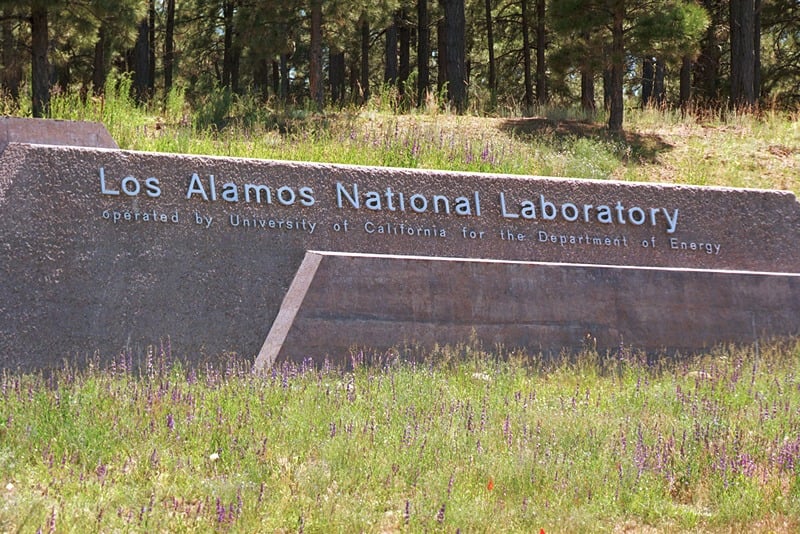 LOS ALAMOS, NM: (FILE PHOTO) A sign welcomes visitors to the Los Alamos Laboratory after they cross over the Omega Bridge June 14, 1999 in Los Alamos, New Mexico. According to congressional sources, the Energy Department plans to open the contract to run the laboratory to competitive bidding. The University of California has been running the lab since the original atom bomb tests 60 years ago but a number of highly publicized cases have damaged the lab?s reputation and their?s. (Photo by Joe Raedle/Getty Images)