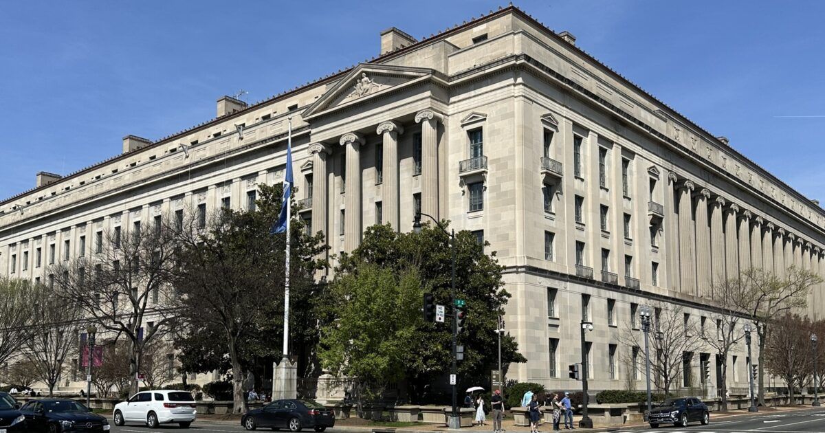 Robert F. Kennedy Department of Justice Building for a ProCoinNews article about the Huione cloud-account seizure.