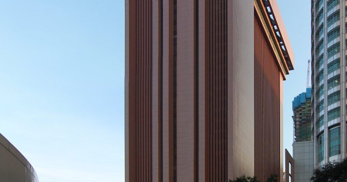 Monetary Authority of Singapore building for a ProCoinNews article about Hyperliquid and Singapore's Investor Alert List.