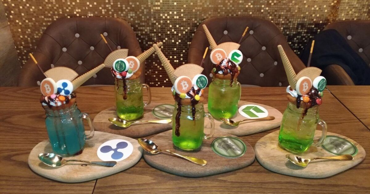 Ripple XRP and other crypto-themed drinks for a ProCoinNews article about XRP defending the $1 support area.