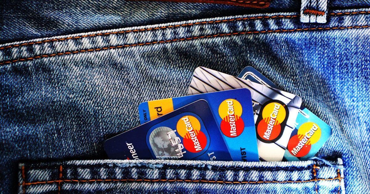 Mastercard credit cards in a jeans pocket