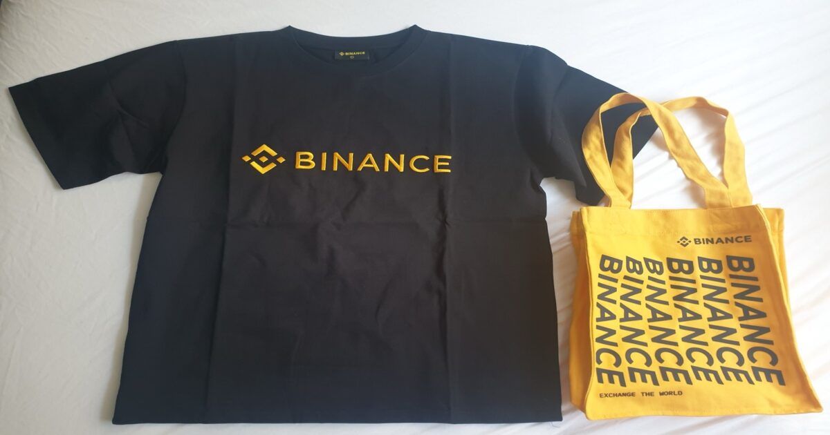 Binance-branded shirt and event bag