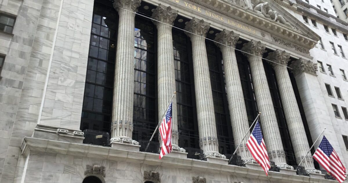 New York Stock Exchange facade for a story about onchain IPO infrastructure.