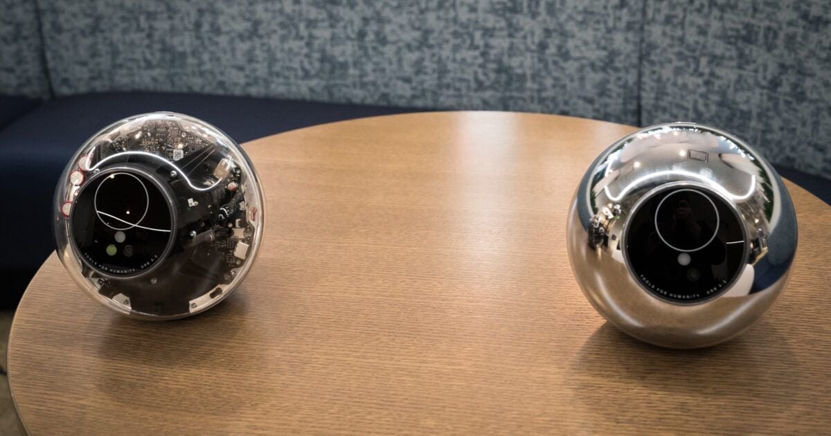 Worldcoin biometric Orb devices on display at the 2024 StrictlyVC event.