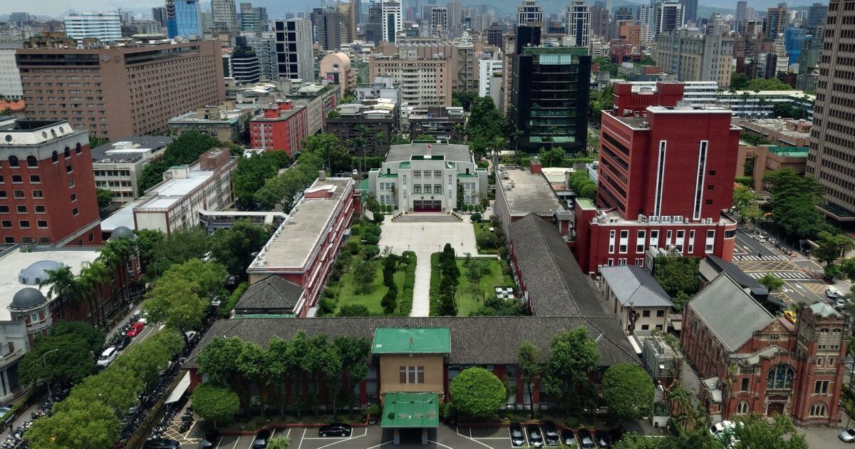 Taiwan Legislative Yuan building and cityscape for a ProCoinNews article about Taiwan's new crypto and stablecoin law.