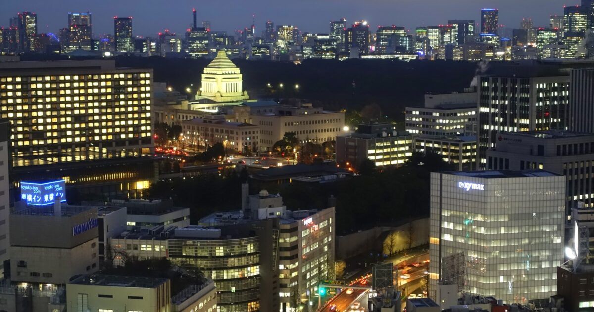 Japan's National Diet Building illuminated at night in Tokyo.