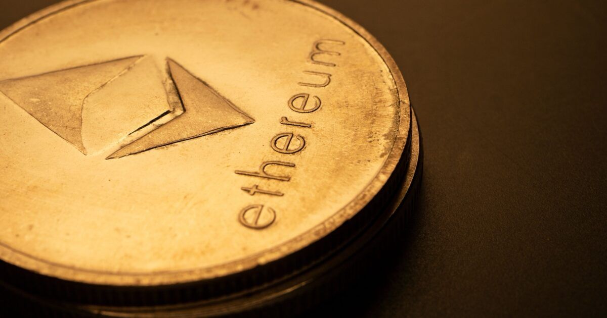 Stacked physical Ethereum tokens illustrating BitMine approaching its five percent ETH treasury target