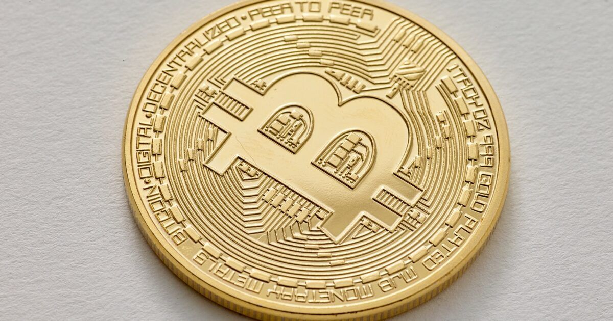 Gold Bitcoin token representing measured profit-taking after a strong rally