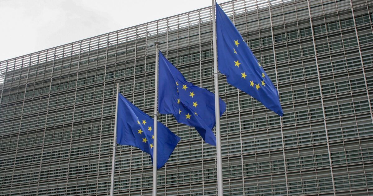 European Union flags outside a European Commission building in Brussels